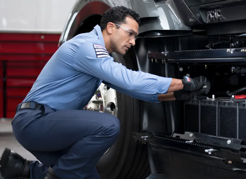 Technician Replacing Battery